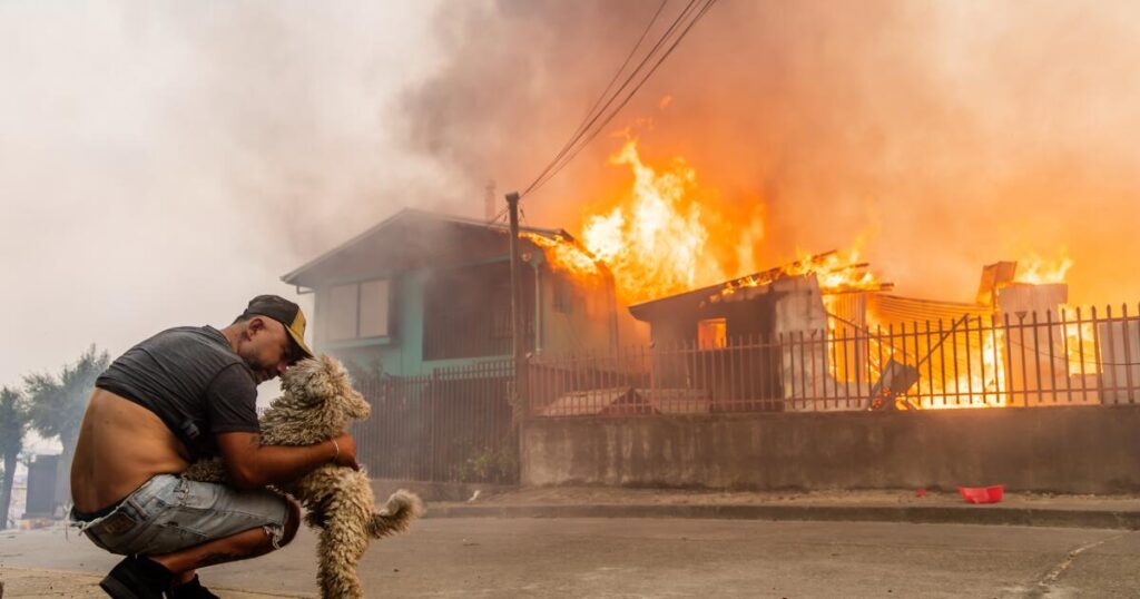 Wildfires race across Chile, leaving 18 dead and forcing 50,000 to flee