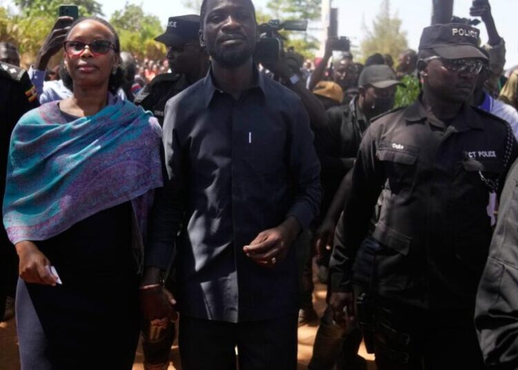 ‘Swarm of men’ attack wife of Ugandan opposition leader, try to force her to disclose his location