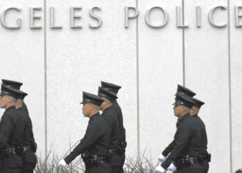 Maserati driver kills man and dog crossing Sherman Oaks street, flees scene and then abandons car