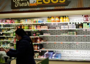 Crews spread salt on roads and people stock up on batteries as a winter storm threatens the U.S.