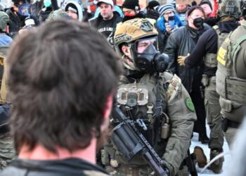 Minneapolis protesters vent their outrage after an ICE officer kills a woman