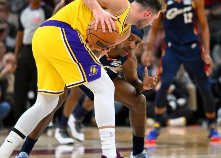 Cavaliers court raises safety concerns again as Luka Doncic injures leg