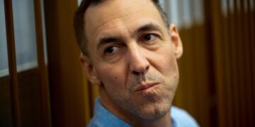 Russia frees French political scholar in a prisoner swap for a basketball player