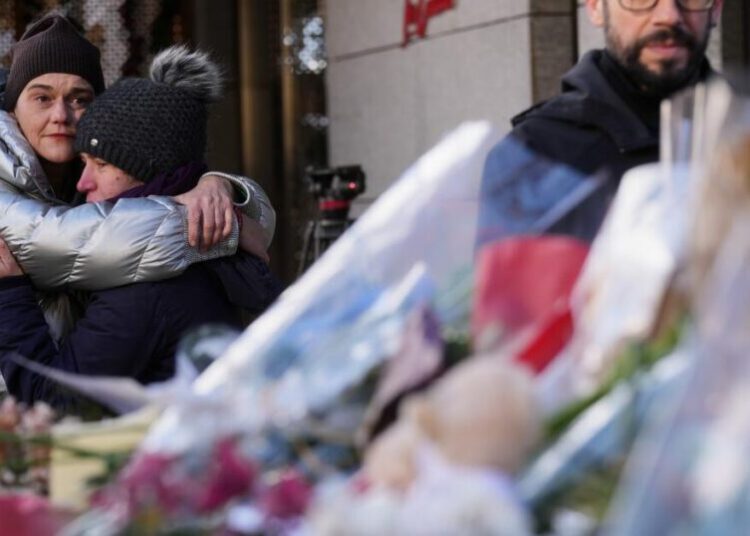 Swiss investigators believe sparkling flares atop wine bottles ignited fatal bar fire