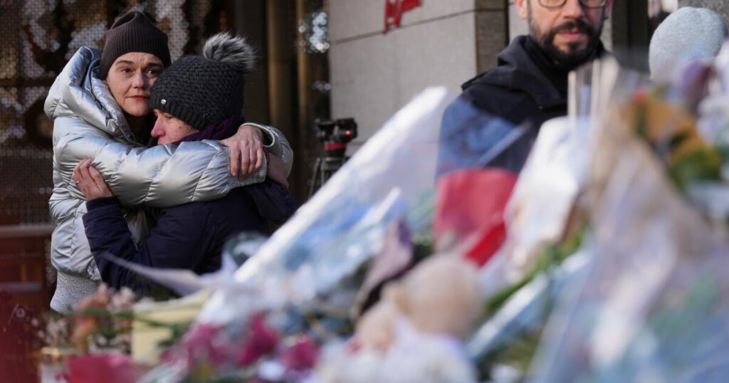 Swiss investigators believe sparkling flares atop wine bottles ignited fatal bar fire