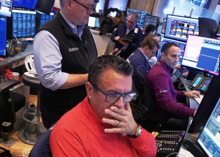 Wall Street pulls back from its records as JPMorgan Chase and Delta kick off earnings season