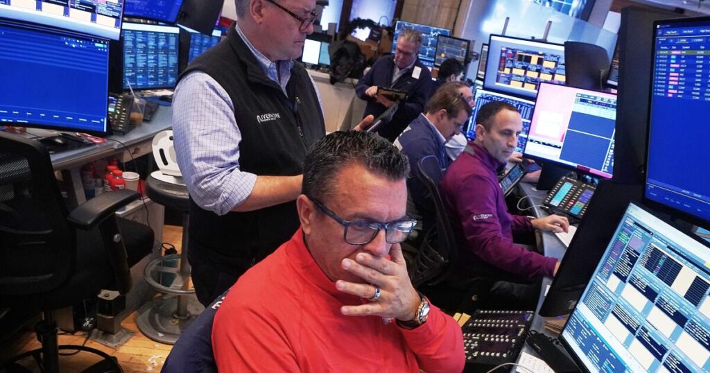 Wall Street pulls back from its records as JPMorgan Chase and Delta kick off earnings season