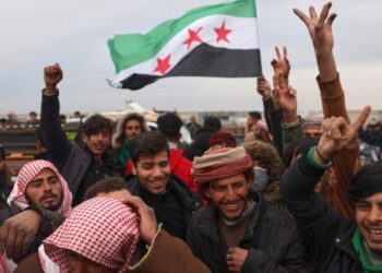 Syrian government forces enter northern towns after U.S.-backed Kurdish fighters agree to evacuate