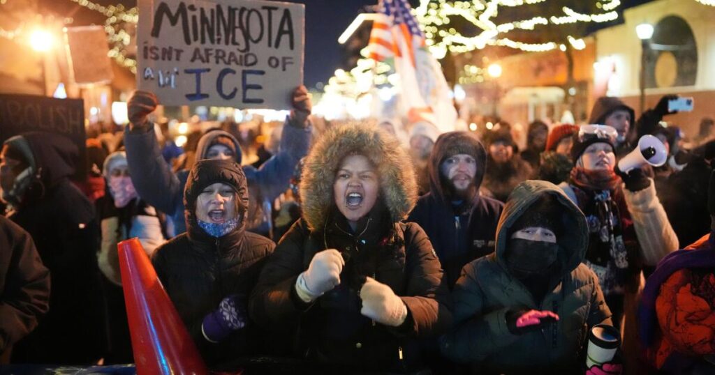 From frigid quiet to outraged sorrow, a few hours on Minneapolis street where agents killed man