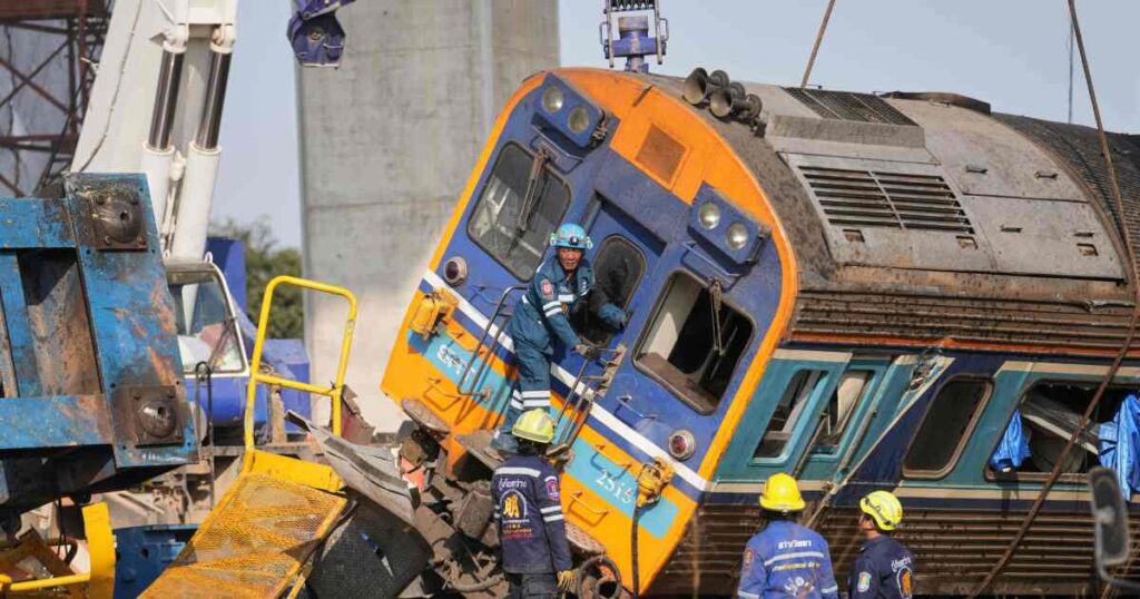 A construction crane falls onto a moving train in Thailand, killing at least 32 people