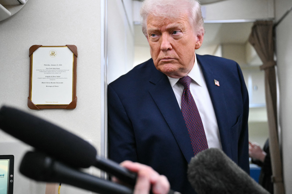 President Donald Trump speaks to reporters while in flight on Air Force One, traveling from Shannon, Ireland en route Joint Base Andrews in Maryland on January 22, 2026. 