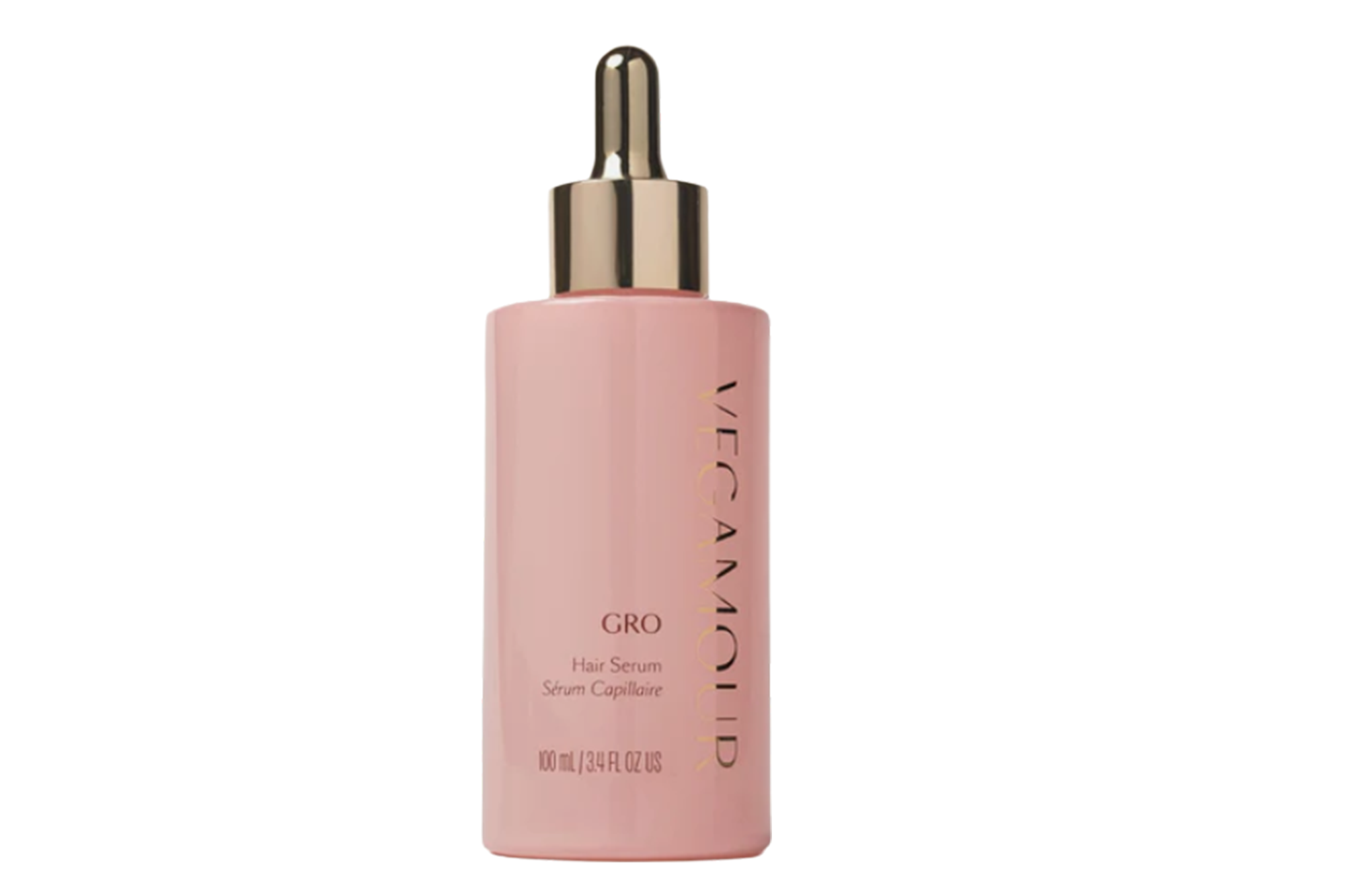 Vegamour GRO Hair Serum in a pink bottle with a gold dropper top.
