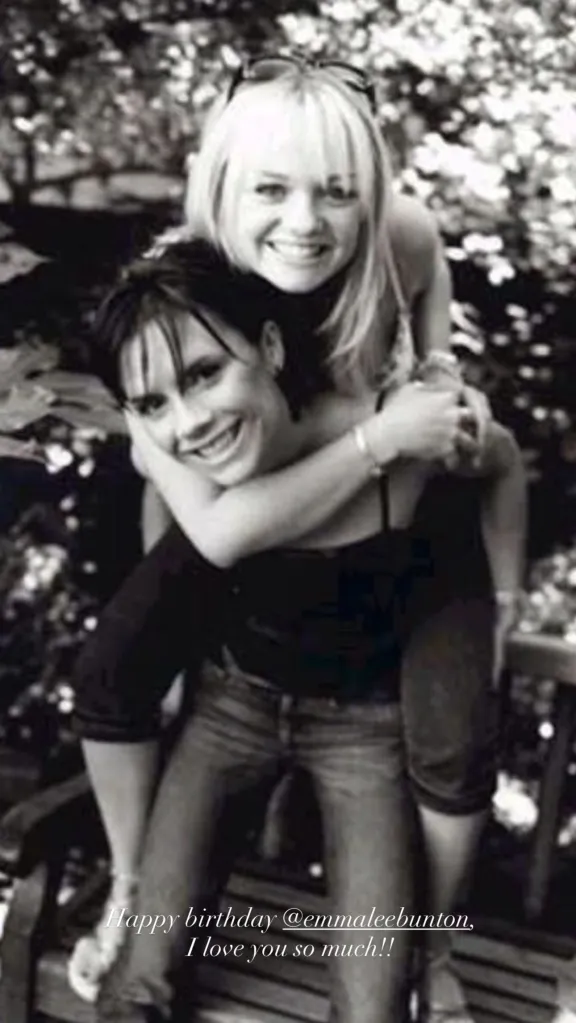 Victoria Beckham giving Emma Bunton a piggyback ride, both smiling.