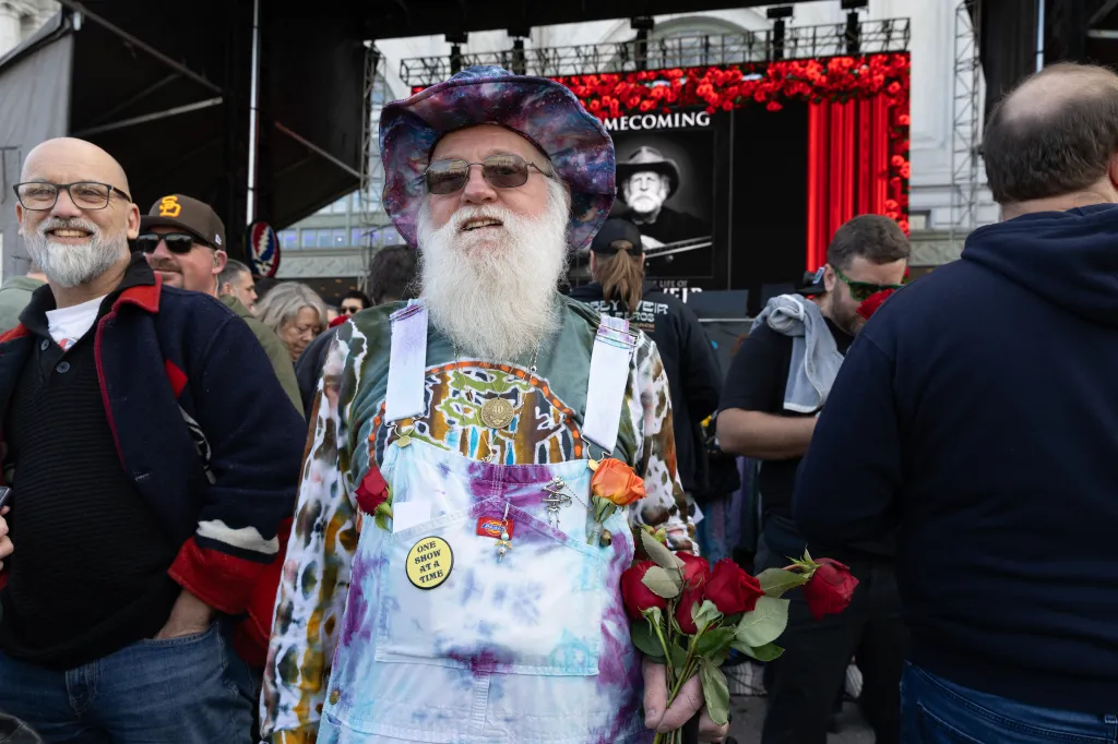 Saturday’s celebration brought plenty of fans with long dreadlocks and wearing tie-dye clothing, some using walkers.