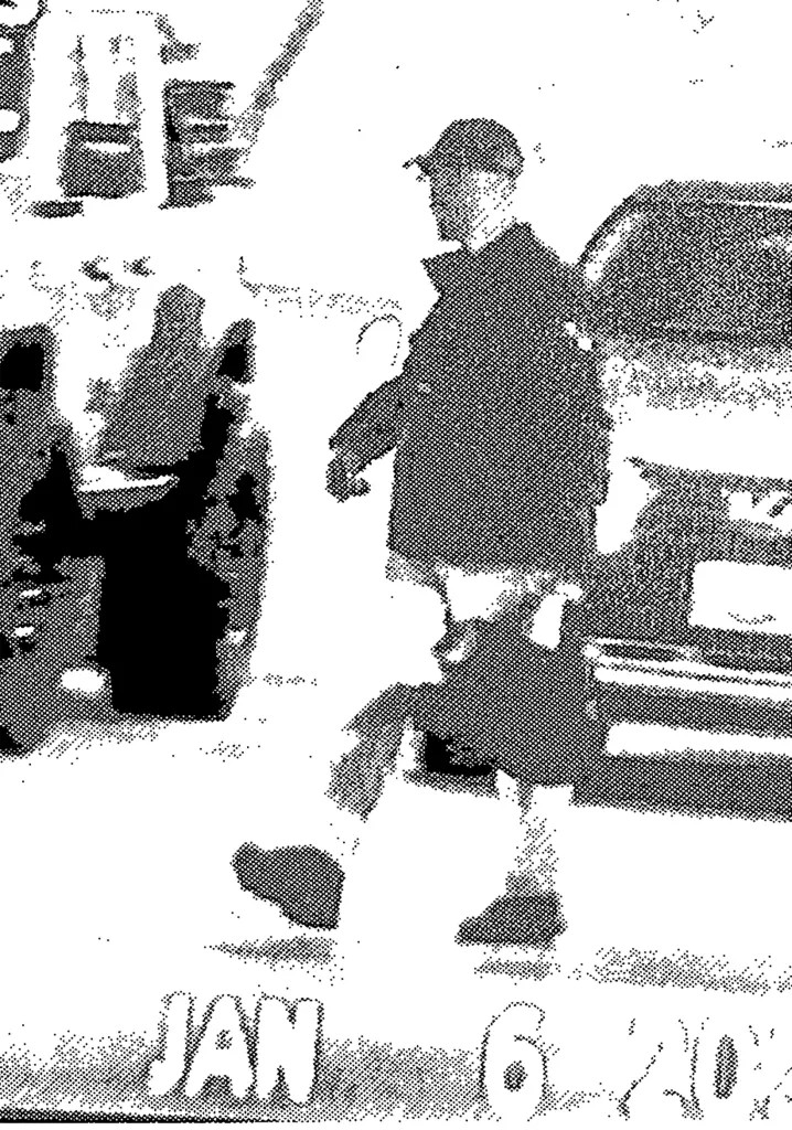 Aurelio Luis Perez-Lugones, a U.S. Navy veteran and federal government contractor, captured in a grainy surveillance image, possibly after stealing classified information.