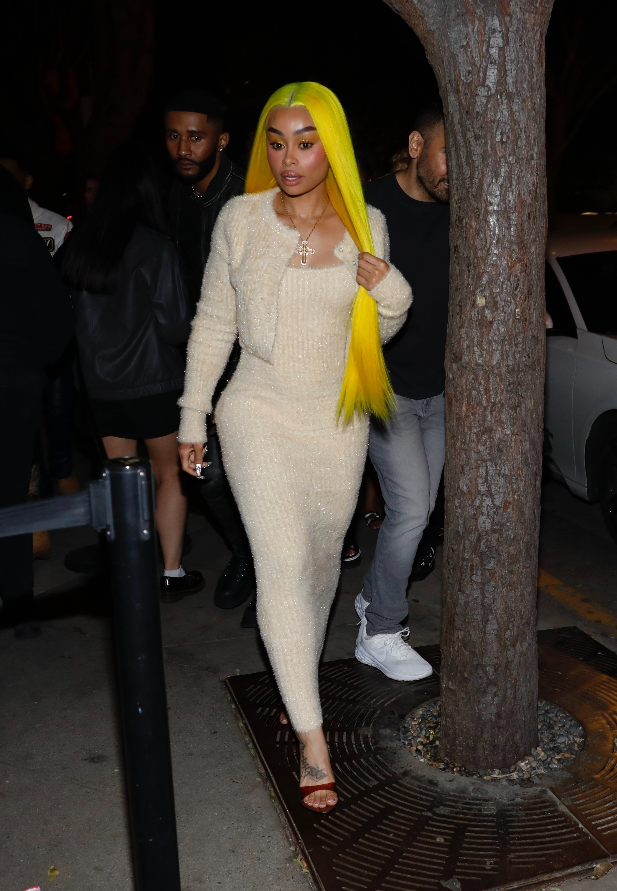 Blac Chyna in a cream-colored maxi dress and yellow hair while out in West Hollywood.