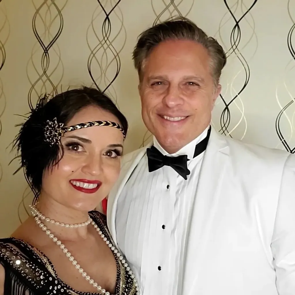 For New Years McKellar was dressed in a black, sparkly flapper dress while her husband, Scott Sveslosky, wore a white tux with a black bow tie.