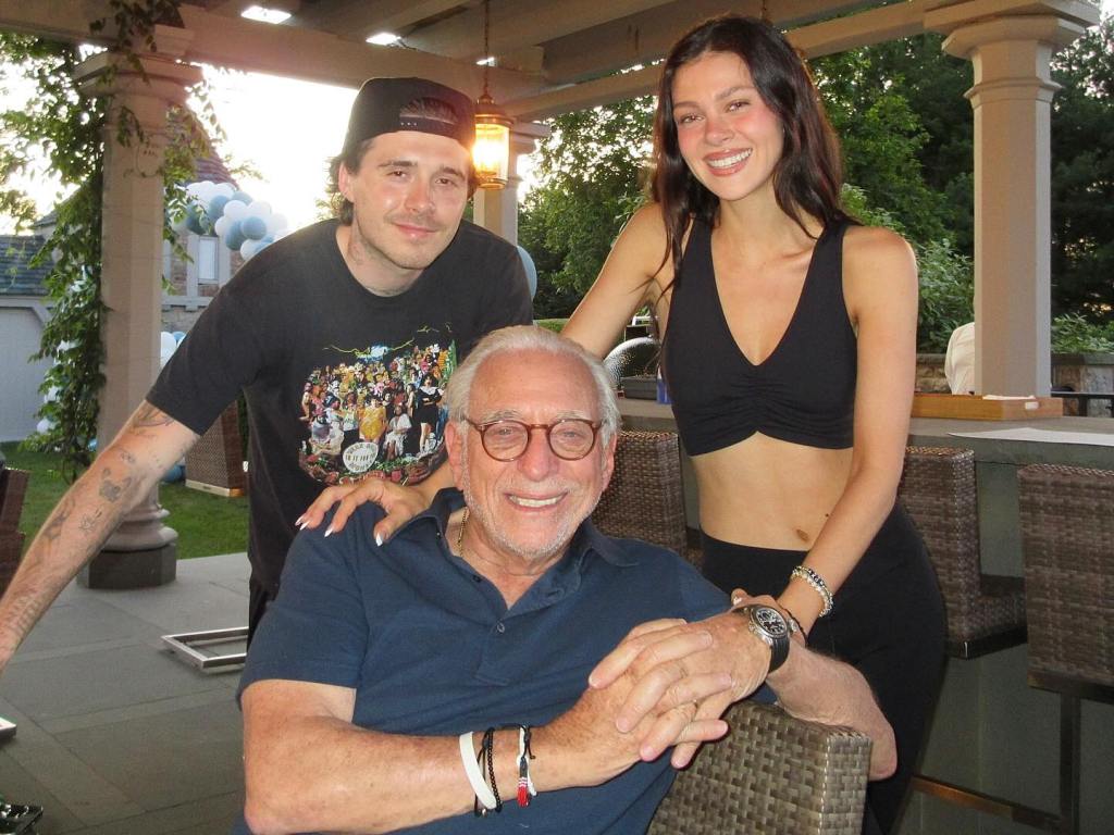 Nicola Peltz and her father Nelson with Brooklyn Beckham.
