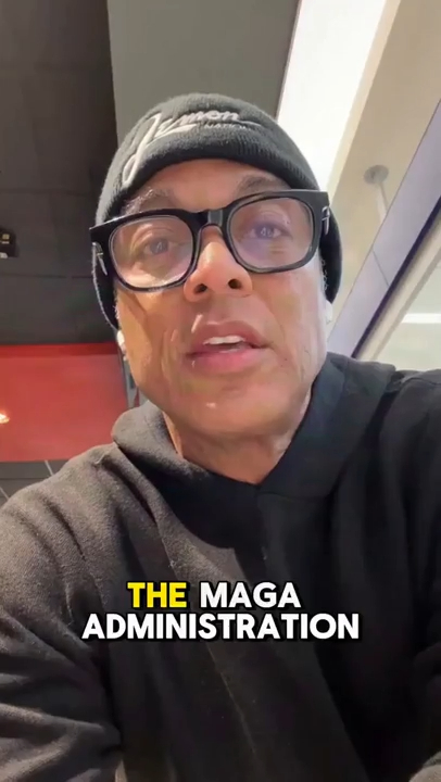 Don Lemon wearing a black beanie and glasses, with the text 