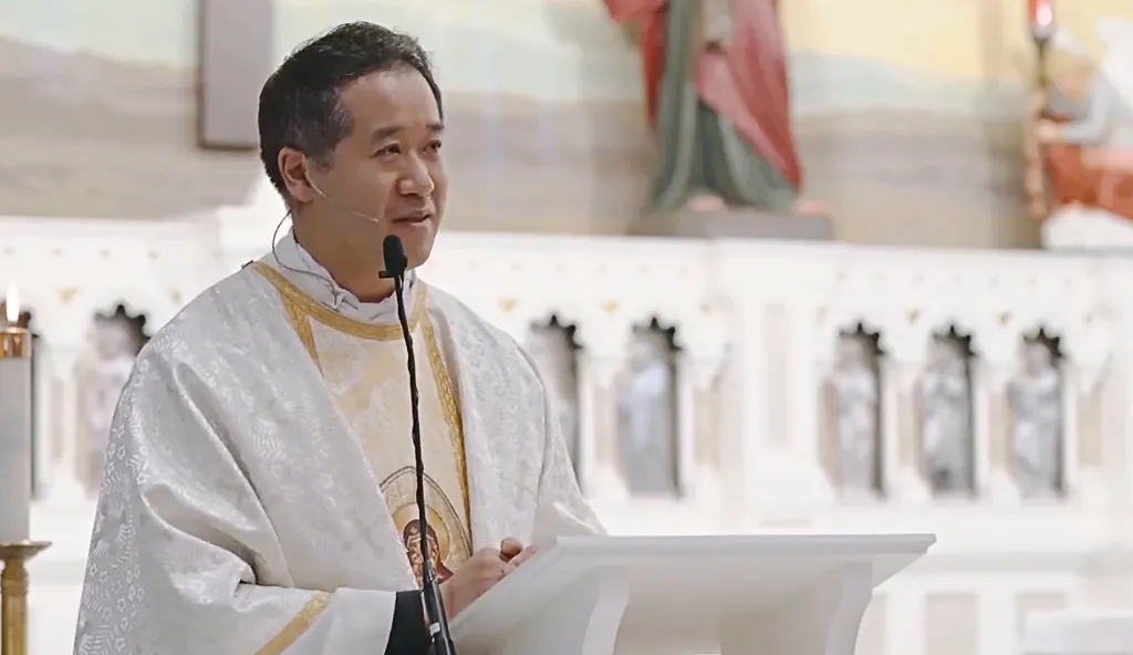 Father Eric Mah delivering the Taylor Swift sermon.