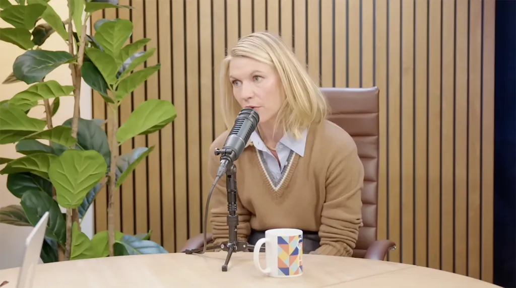 Claire Danes speaking into a microphone.
