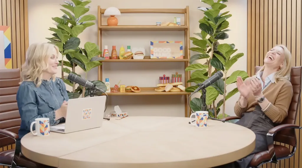 Amy Poehler and Claire Danes laughing while recording a podcast called Good Hang.