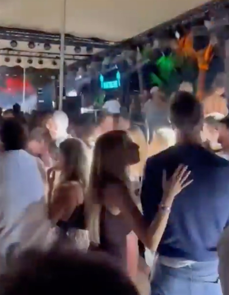 Alix Earle and Tom Brady at a New Year's Eve party.