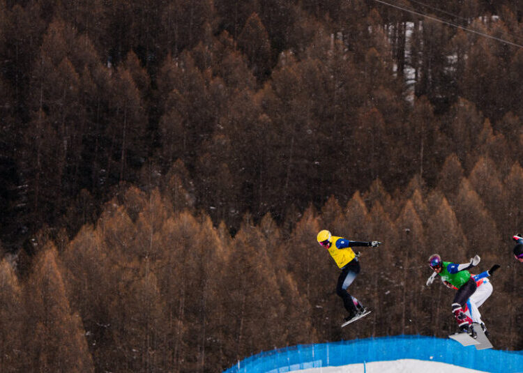 From the chaos of snowboard cross, a repeat champ emerges.