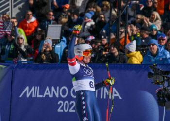 Breezy Johnson’s celebration is muted by Lindsey Vonn’s crash.