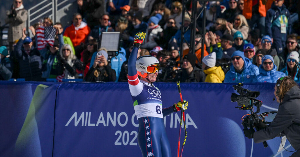 Breezy Johnson’s celebration is muted by Lindsey Vonn’s crash.
