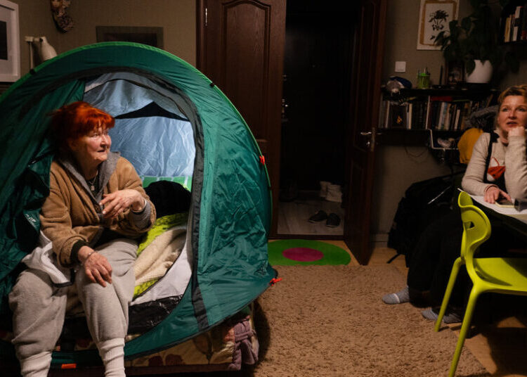 Russia Knocked Out the Heat. So She Slept in a Tent on Her Bed.