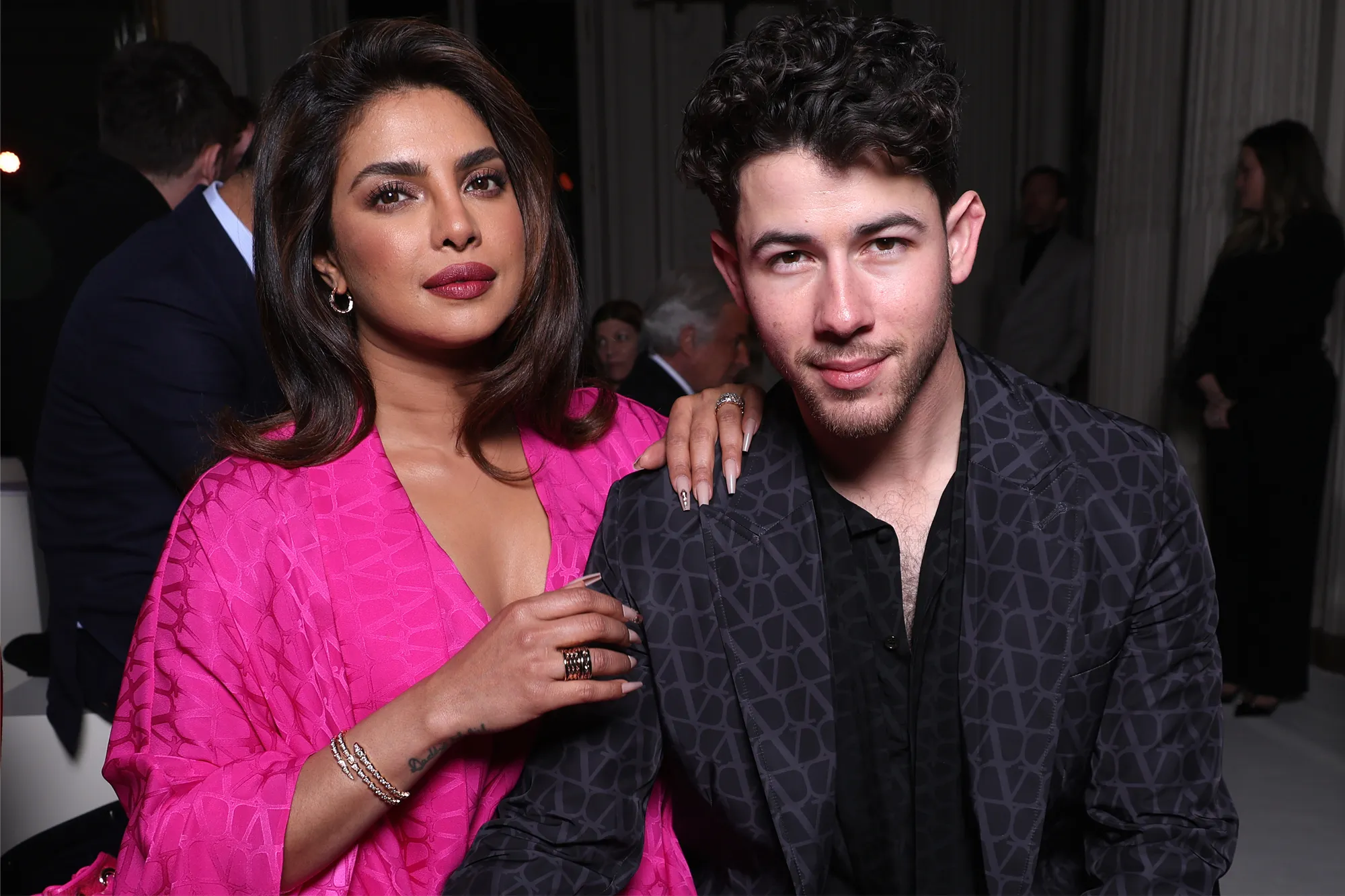 Priyanka Chopra and Nick Jonas pose for a photo.