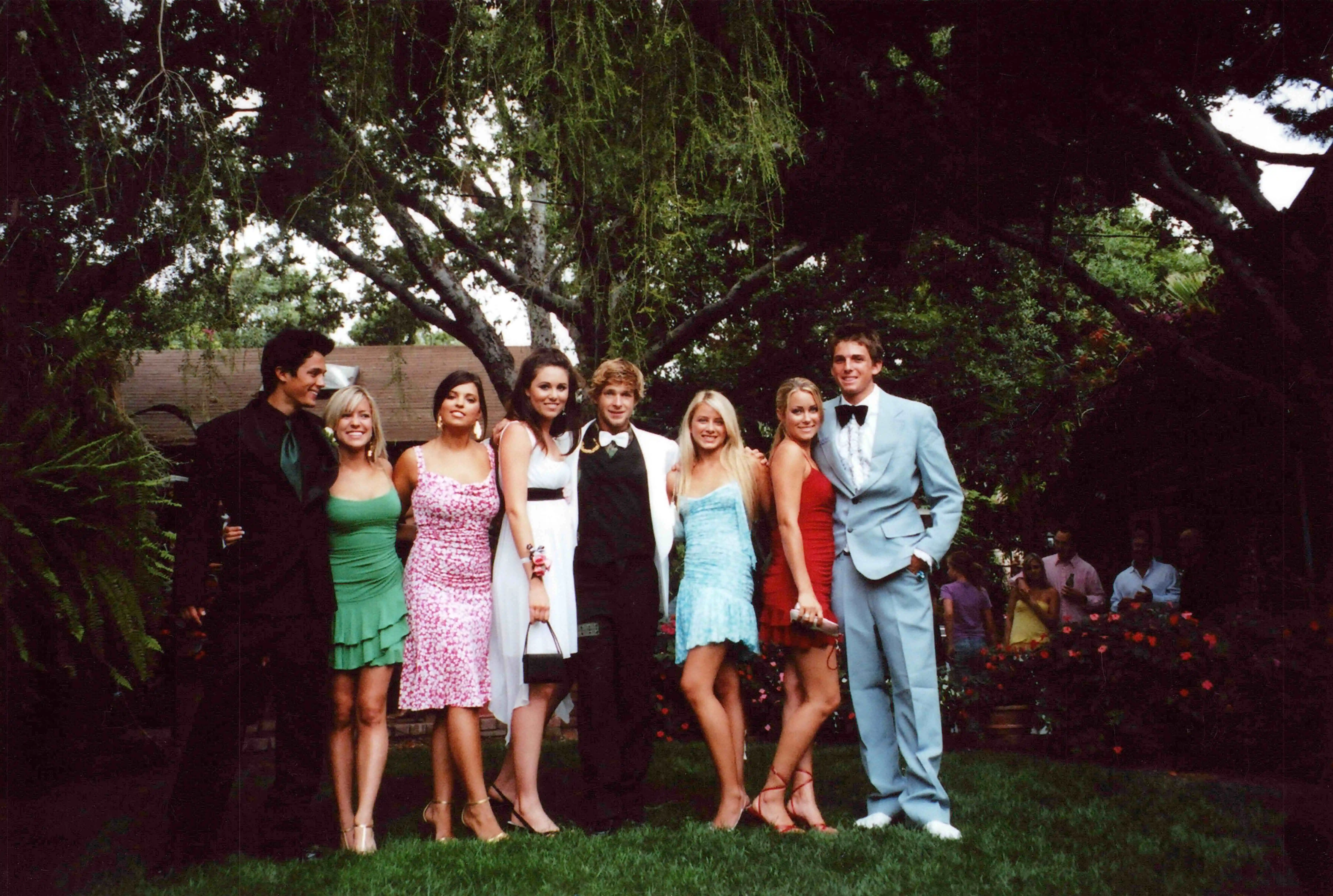 Laguna Beach High School reunion attendees posing for a photo.