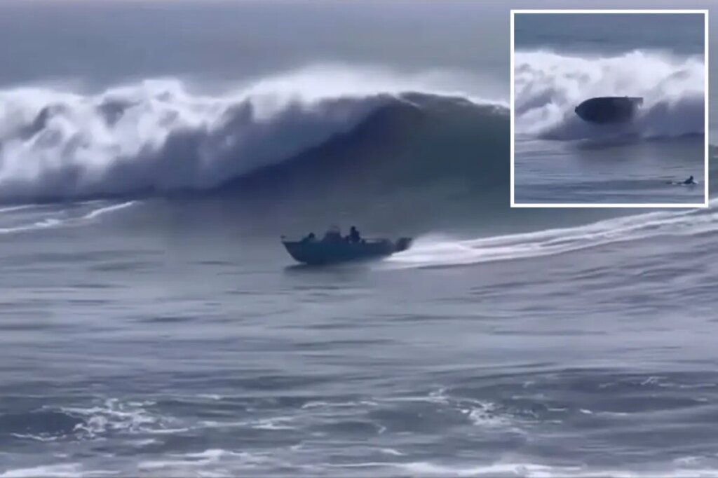 Dramatic video shows family of six thrown out of boat after taking on massive wave