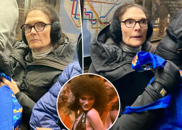 ‘Scarface’ bombshell looks unrecognizable while riding NYC subway