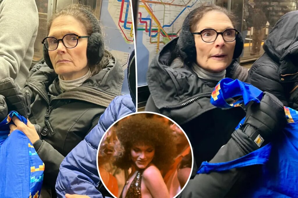 ‘Scarface’ bombshell looks unrecognizable while riding NYC subway