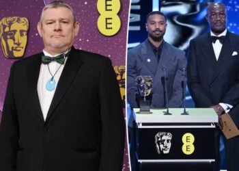 Tourette’s activist John Davidson shouts N-word during BAFTAs telecast while Michael B. Jordan and Delroy Lindo present