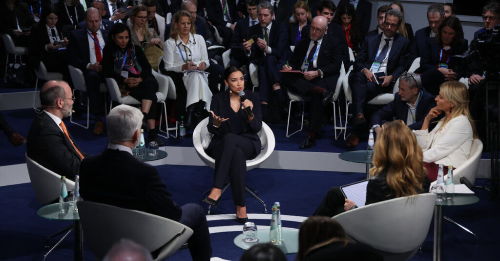 In Munich, Ocasio-Cortez Ties Income Inequality to Rise of Authoritarians