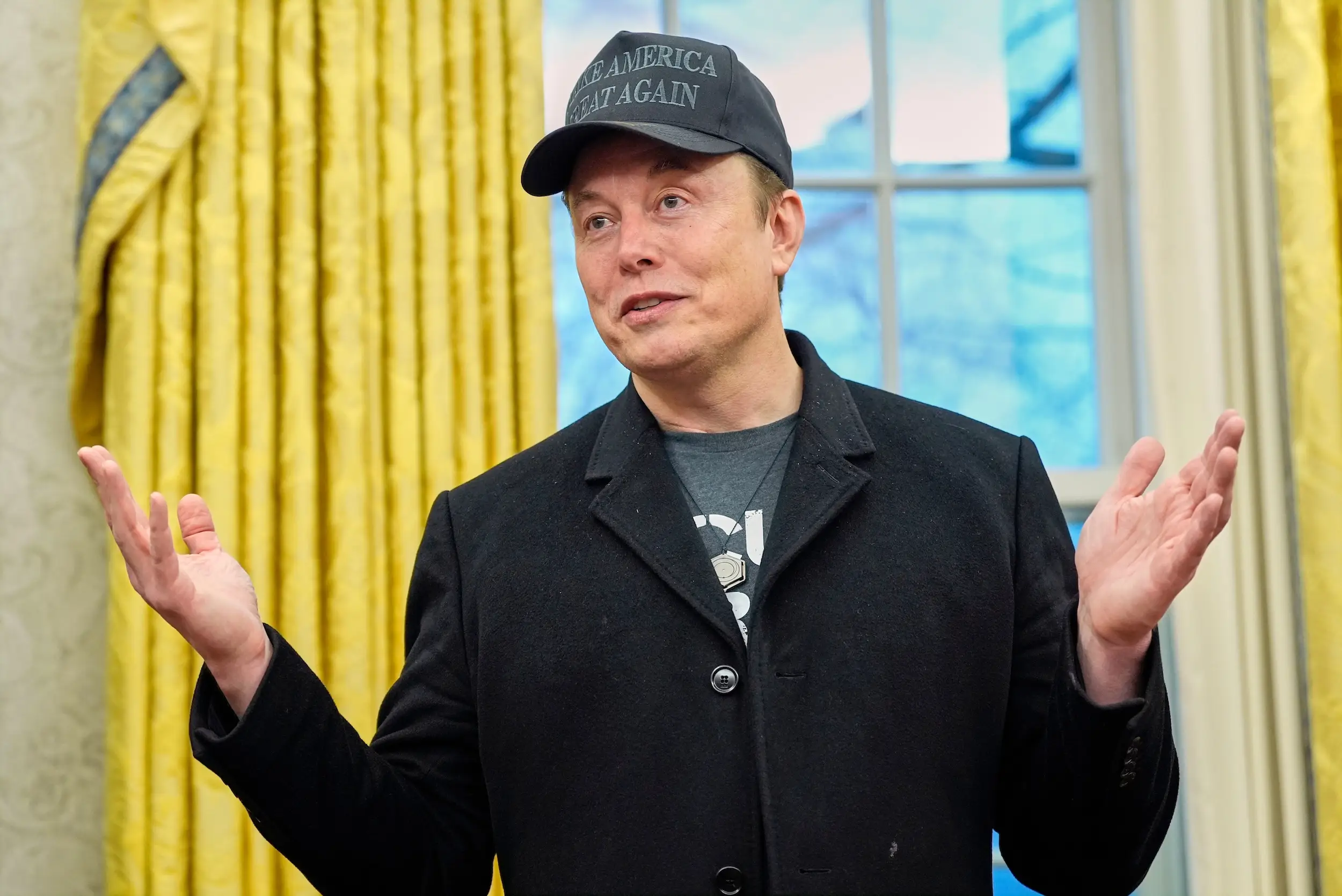 Elon Musk speaks in the Oval Office