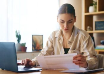 The job market is so tough white-collar workers are ‘reverse recruiting,’ shelling out thousands to get headhunters to find them their next role