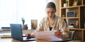 The job market is so tough white-collar workers are ‘reverse recruiting,’ shelling out thousands to get headhunters to find them their next role