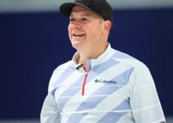 ‘I’m not the dad and I’m not the coach’: Meet the 54-year-old personal injury attorney stealing America’s hearts at the Olympics