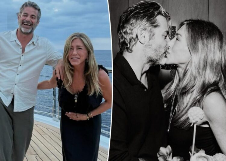 Jennifer Aniston and boyfriend Jim Curtis share an intimate kiss in his 57th birthday tribute to her