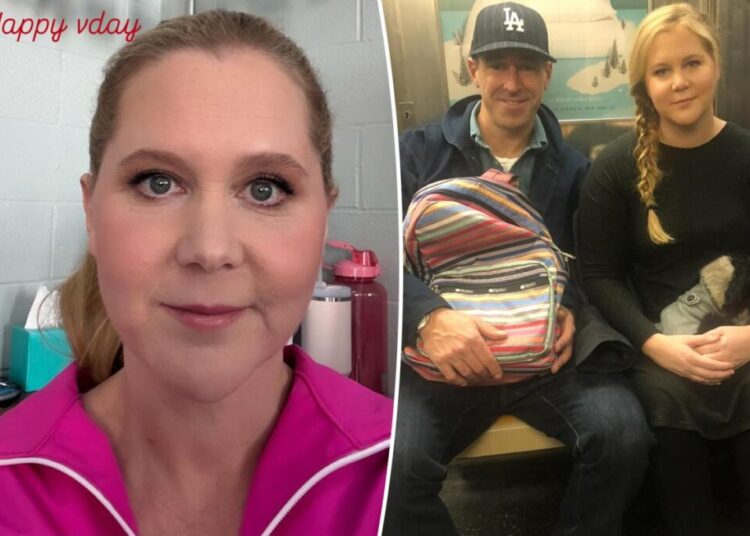 Amy Schumer sits in the ‘crying corner’ for Valentine’s Day following Chris Fischer split