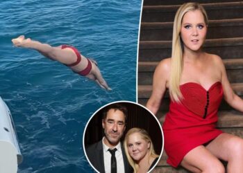 Amy Schumer makes a splash in red hot bikini after first solo Valentine’s Day since Chris Fischer split