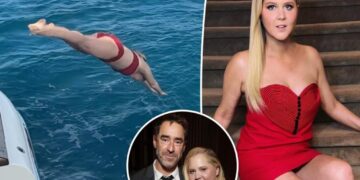 Amy Schumer makes a splash in red hot bikini after first solo Valentine’s Day since Chris Fischer split