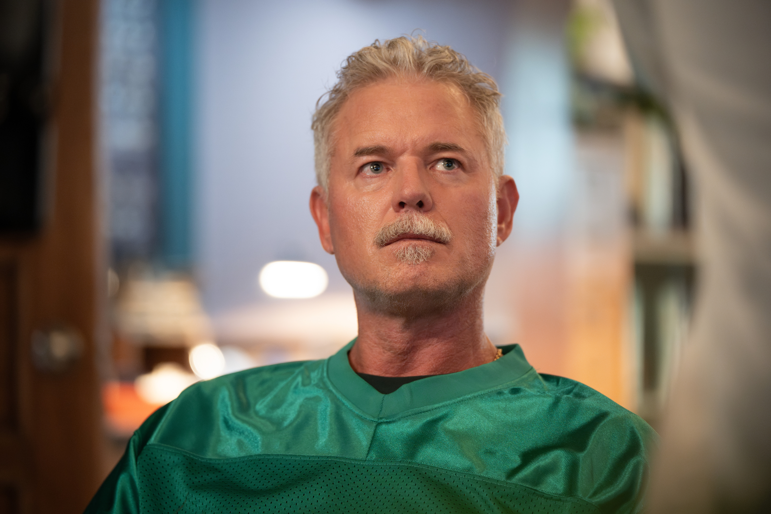 Eric Dane as Matthew Ramati in a green jersey.