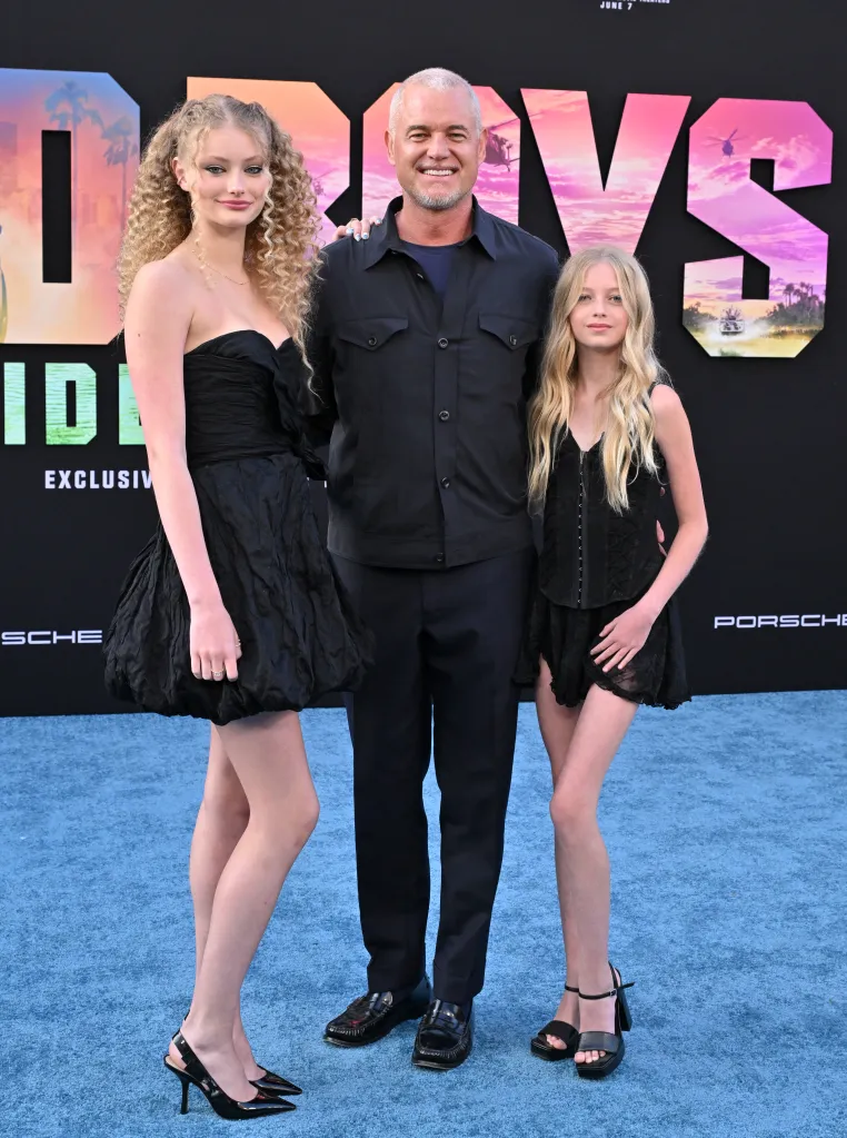 Billie Beatrice Dane, Eric Dane, and Georgia Geraldine Dane posing on a blue carpet at the Los Angeles Premiere of 