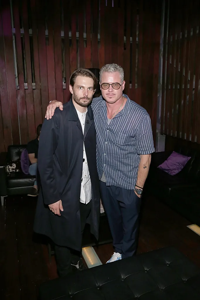 Sam Levinson and Eric Dane standing together at the 