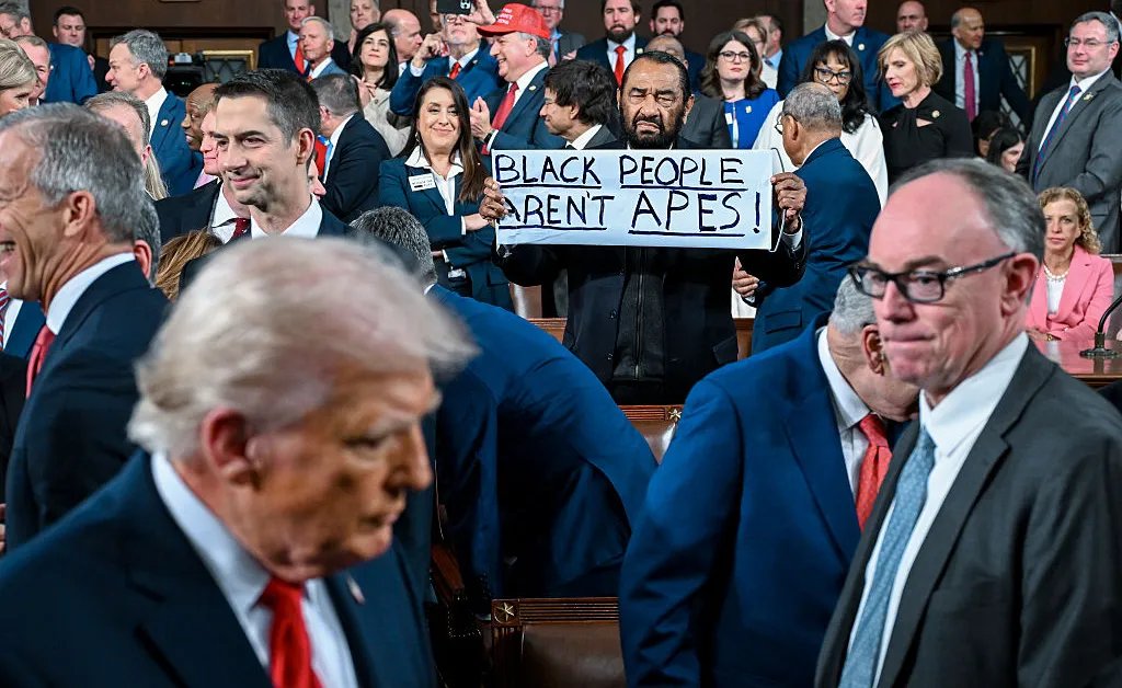 Rep. Al Green Removed From Trump’s State of the Union After Protesting With ‘Black People Aren’t Apes’ Sign